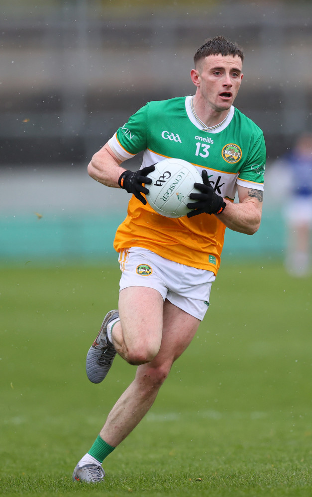 Offaly leave Down's summer hanging by a thread, Laois march on