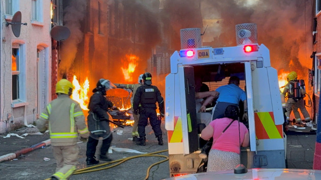 Bus set alight and buildings evacuated in Belfast as anti-immigration protests continue