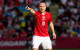 Denmark's Christian Eriksen ‘in good spirits’ after collapsing on pitch during friendly match