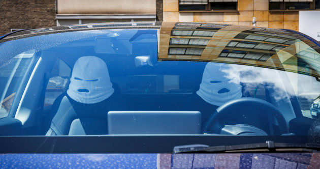Can everyone please stop buying those balaclava headrests for their cars?