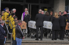 Bodies of four family members killed in arson attack arrive at church ahead of funeral